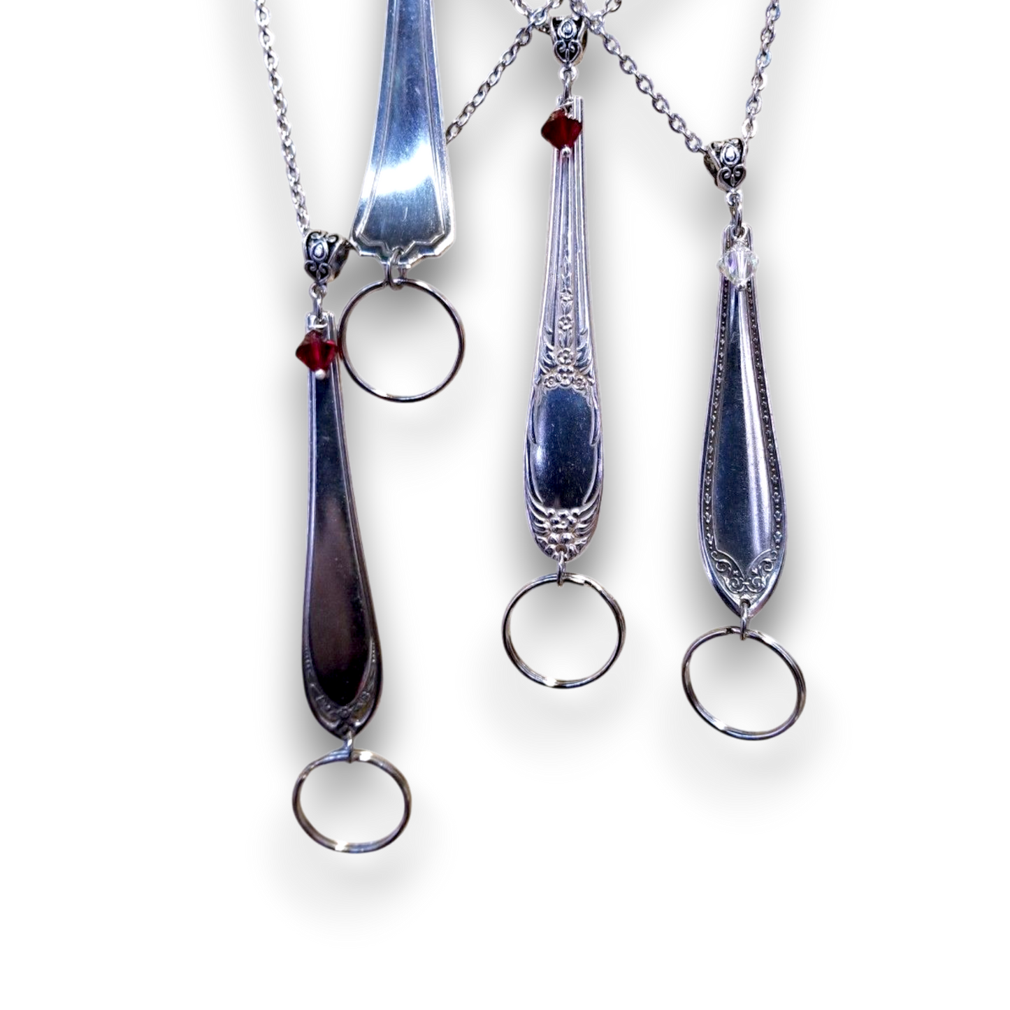 Hellulandian muistojen avainlenkkejä oruja - aterinkorut: lusikka, haarukka, veitsi - varret