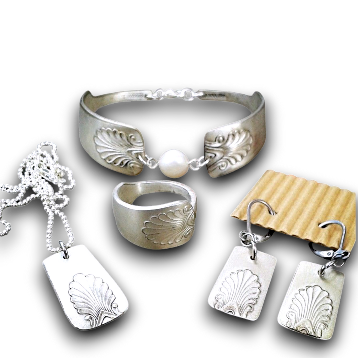 Hellundian muistojen koruja - aterinkorut: lusikka, haarukka, veitsi setti