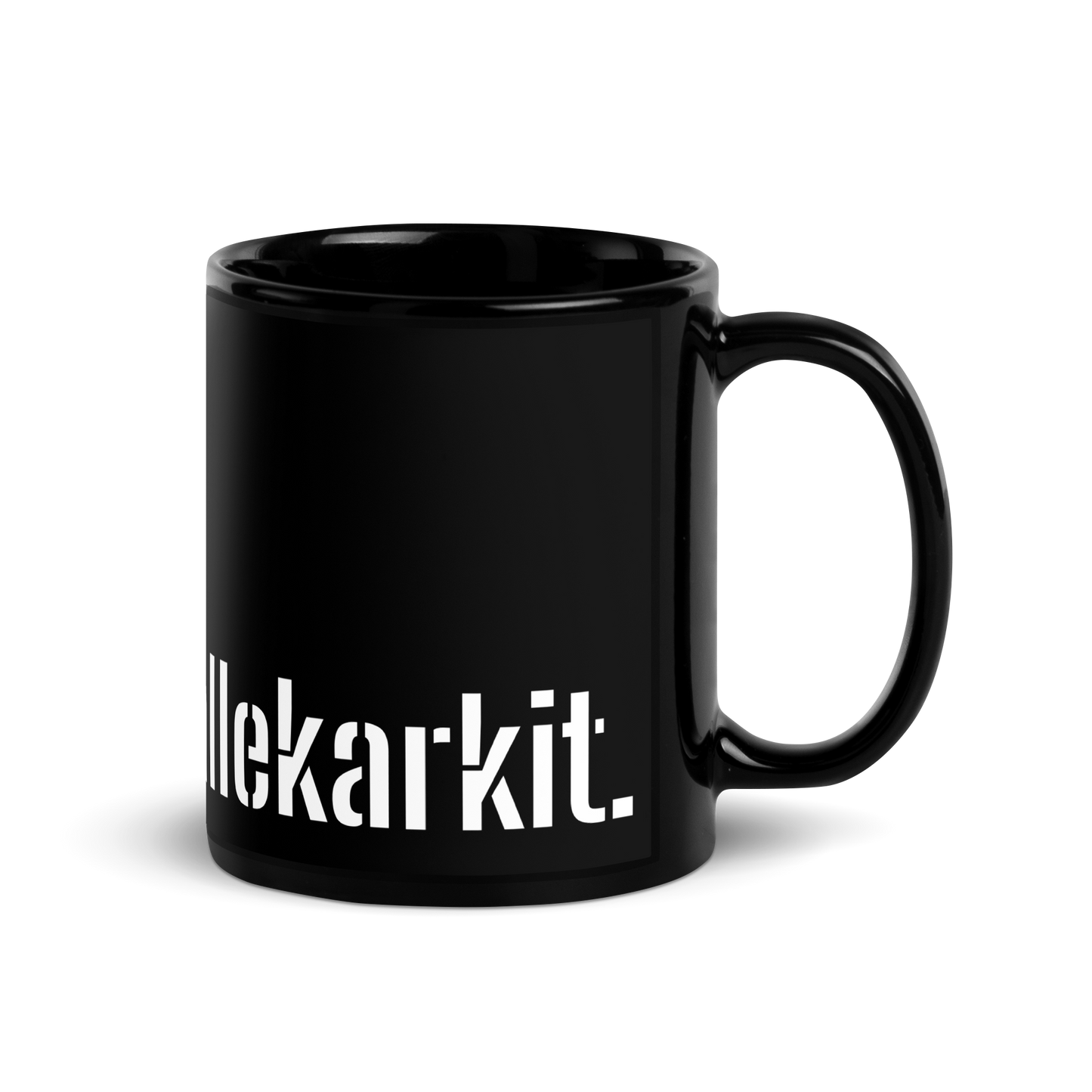 Musta kiiltävä muki - Tasan ei mene nallekarkit.