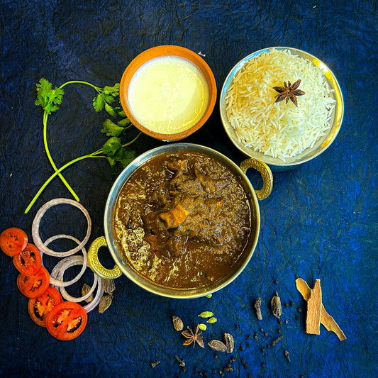 A blue table topped with bowls of food