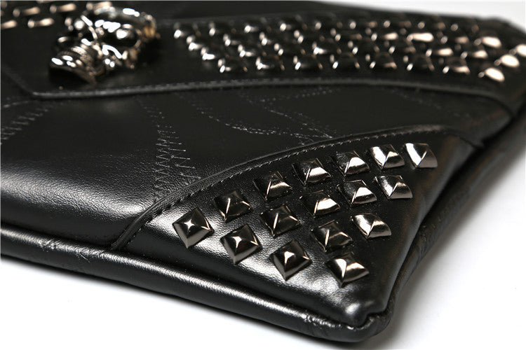 Studded ghost head soft leather hand