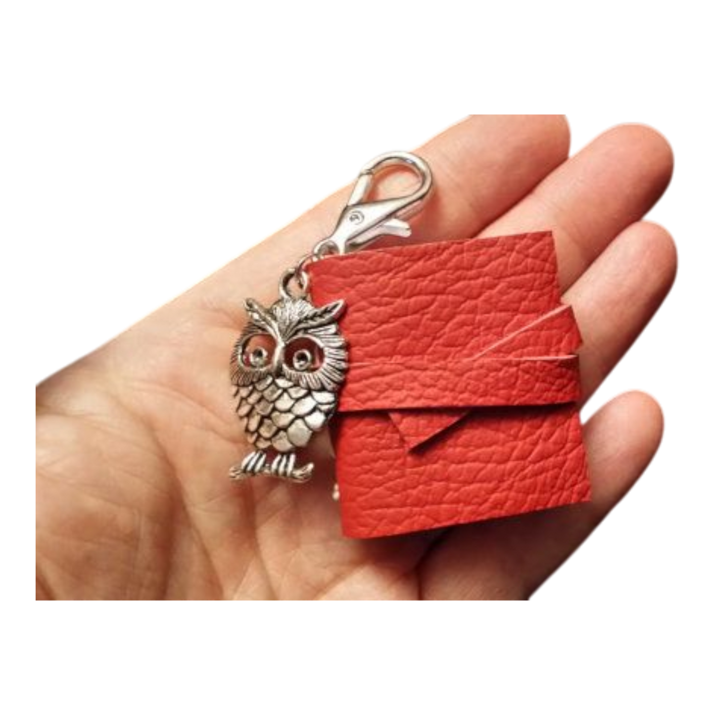 Uniikit korut miniatyylikirjalla ja nahkakansilla